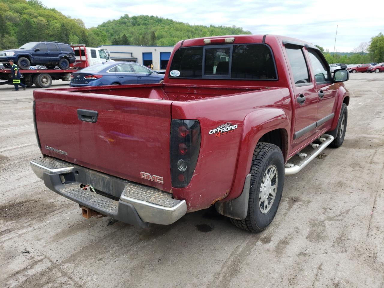 Photo 17 from auction – 2006 GMC CANYON with VIN 1GTDT136268297779