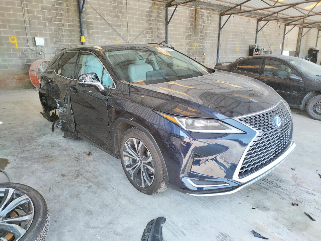 LEXUS RX 450H 2021 with VIN 2T2HGMDA1MC072034 - Photo from auction