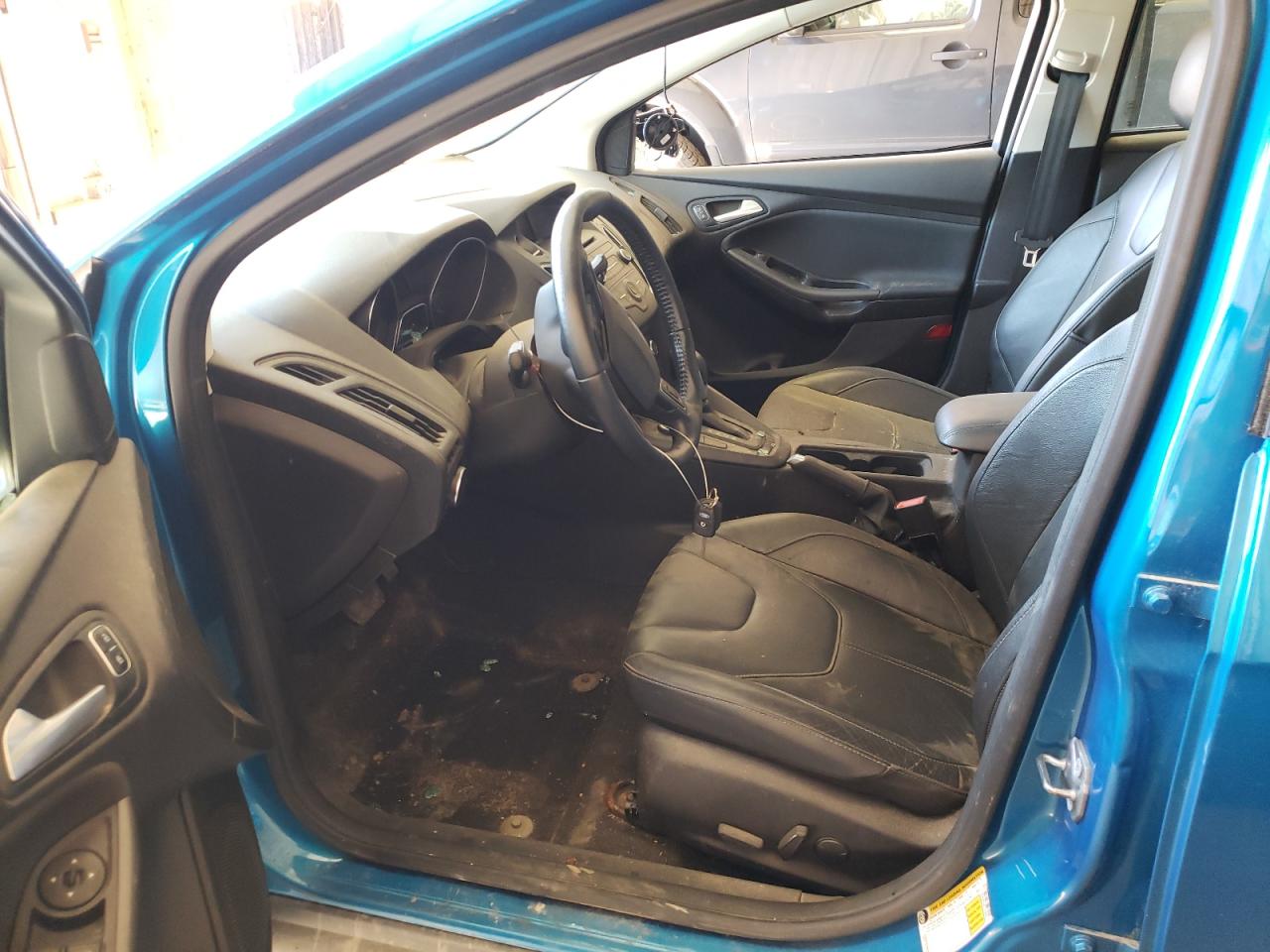 Photo 5 from auction – 2016 FORD FOCUS SE with VIN 1FADP3F25GL226492