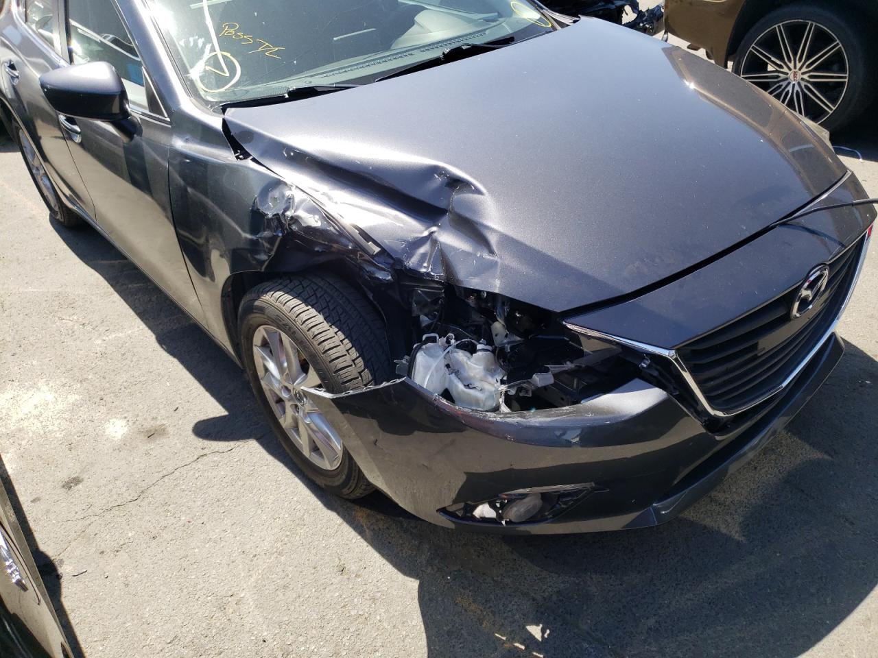 Photo 9 from auction – 2016 MAZDA 3 TOURING with VIN JM1BM1L72G1320212