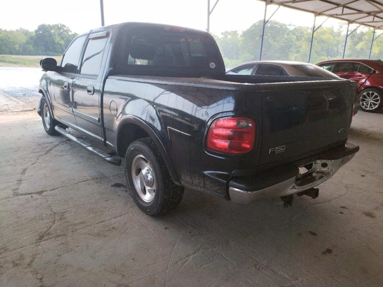 Photo 3 from auction – 2003 FORD F150 SUPER with VIN 1FTRW07L73KA76930