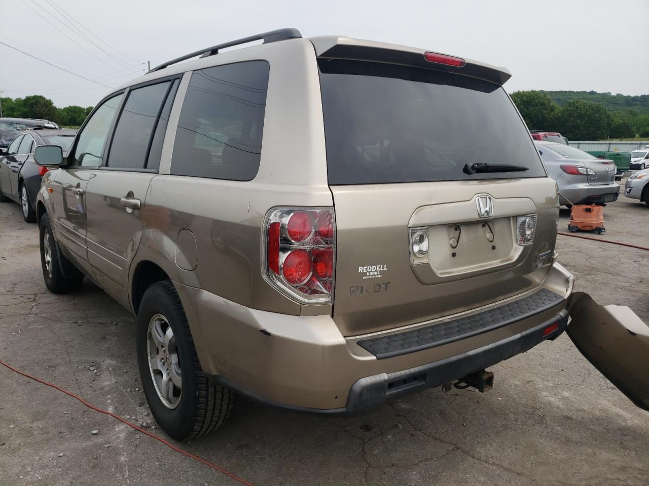 Photo 16 from auction – 2006 HONDA PILOT EX with VIN 2HKYF18576H539718