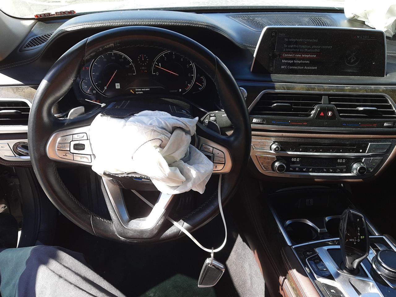 Photo 9 from auction – 2016 BMW 740 I with VIN WBA7E2C56GG547291