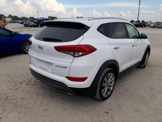 Photo 4 from auction – 2016 HYUNDAI TUCSON LIM with VIN KM8J33A22GU154088