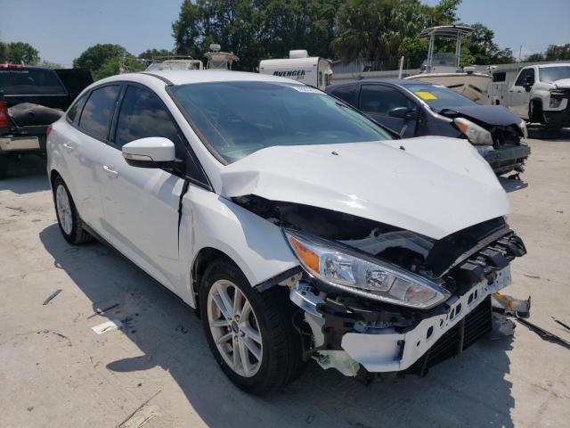 FORD FOCUS SE 2016 with VIN 1FADP3F20GL203962 - Photo from auction