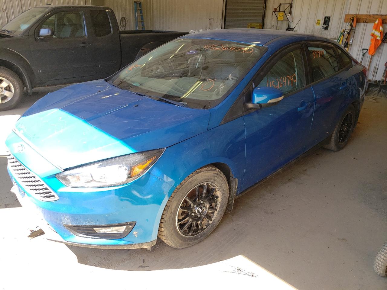 Photo 2 from auction – 2016 FORD FOCUS SE with VIN 1FADP3F25GL226492