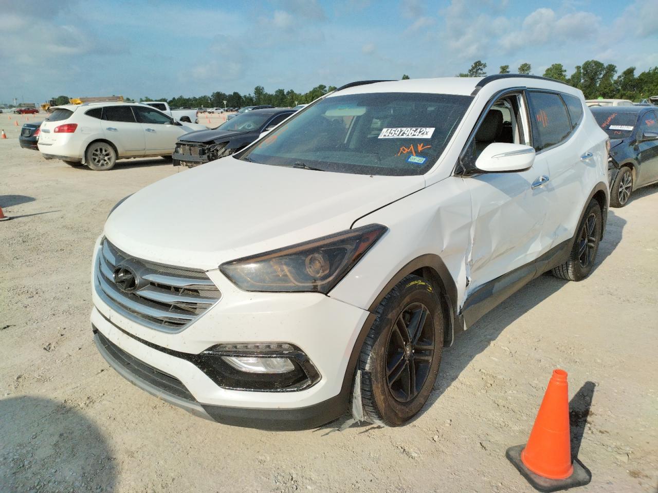 Photo 2 from auction – 2018 HYUNDAI SANTA FE S with VIN 5NMZU3LBXJH100800