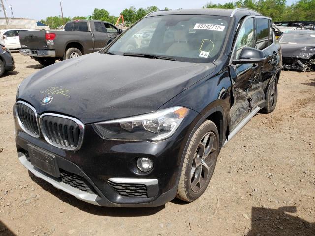 Photo 2 from auction – 2018 BMW X1 XDRIVE2 with VIN WBXHT3C36J5K30439