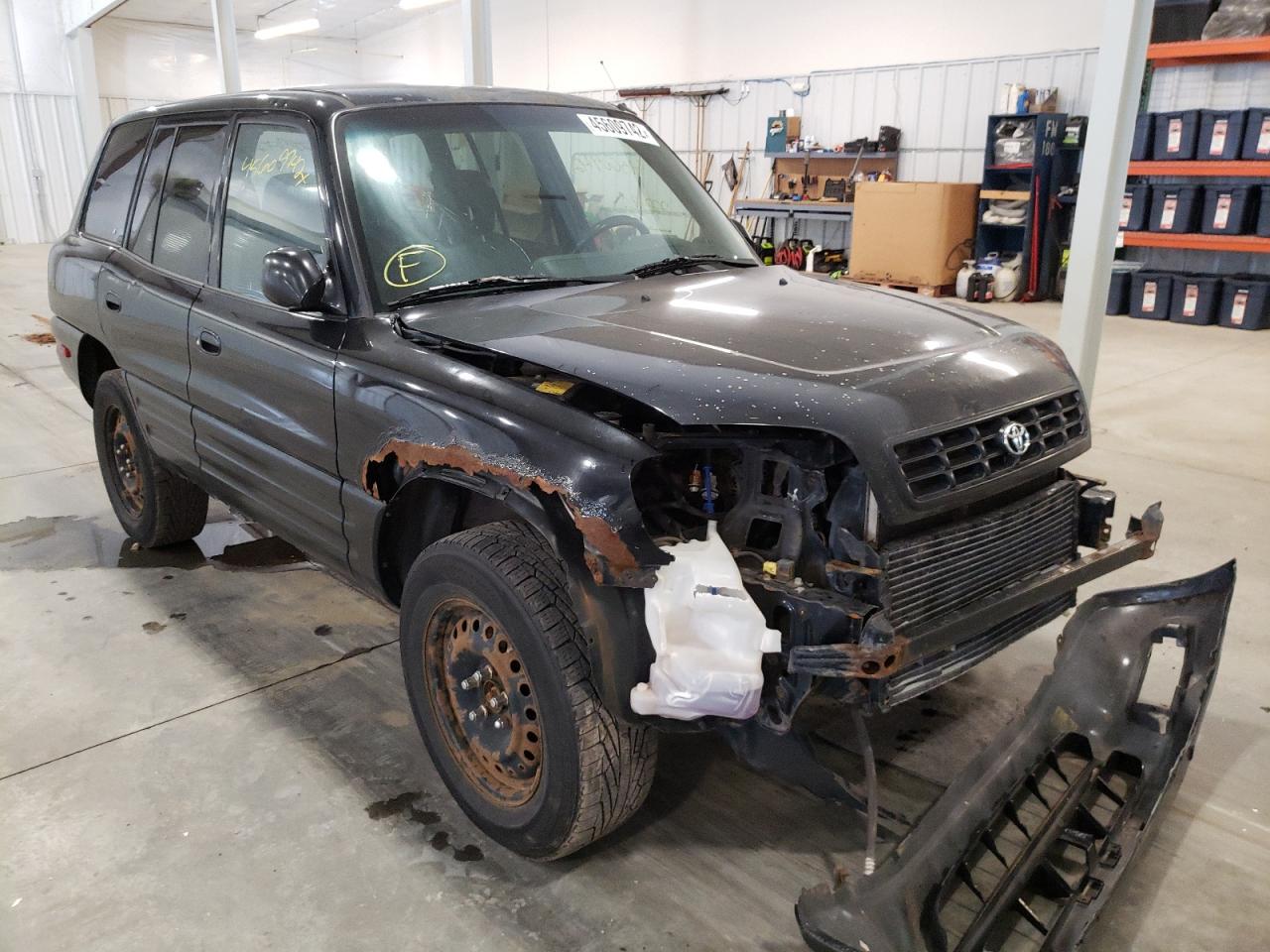 TOYOTA RAV4 1999 with VIN JT3HP10V3X7138170 - Photo from auction