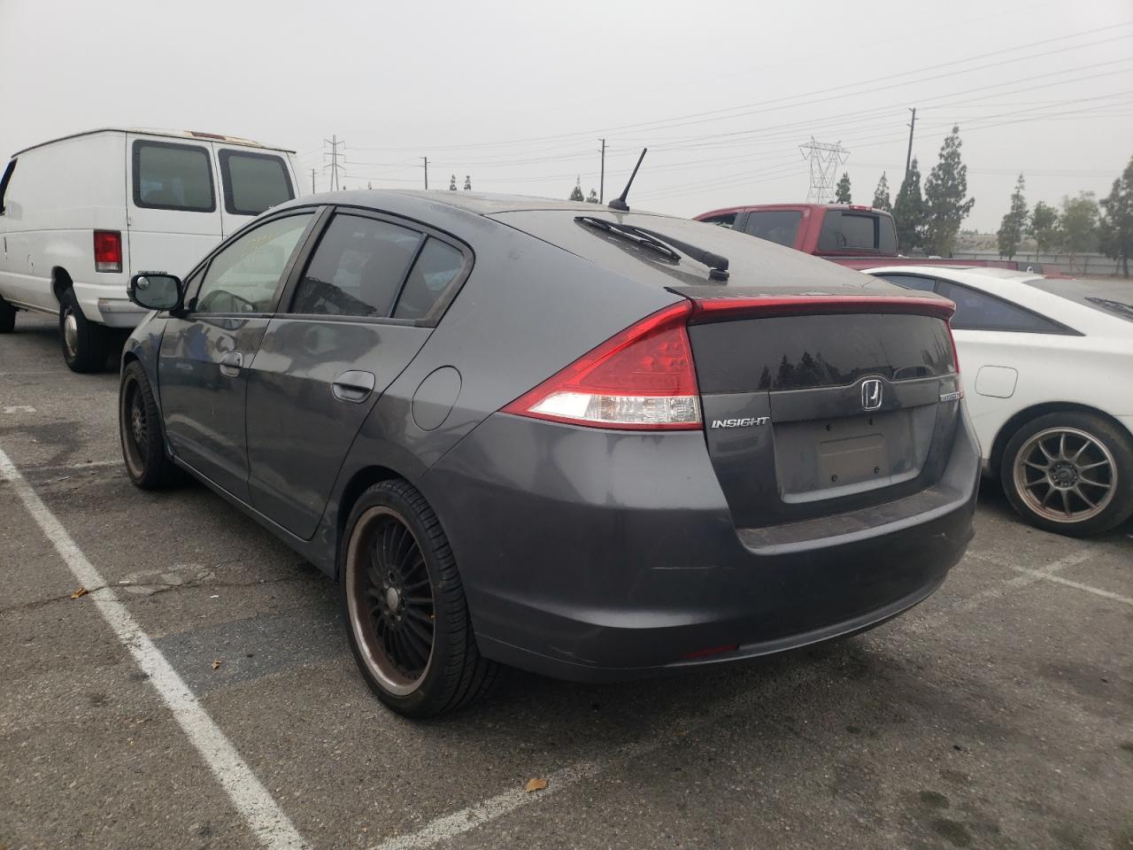 Photo 3 from auction – 2010 HONDA INSIGHT EX with VIN JHMZE2H78AS020443