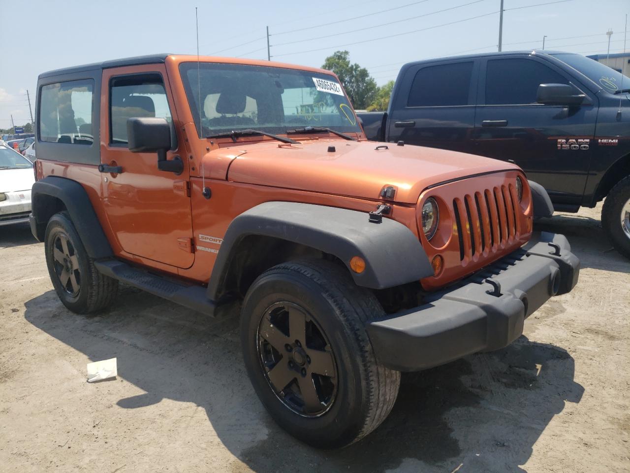 JEEP WRANGLER S 2011 with VIN 1J4AA2D13BL609417 - Photo from auction