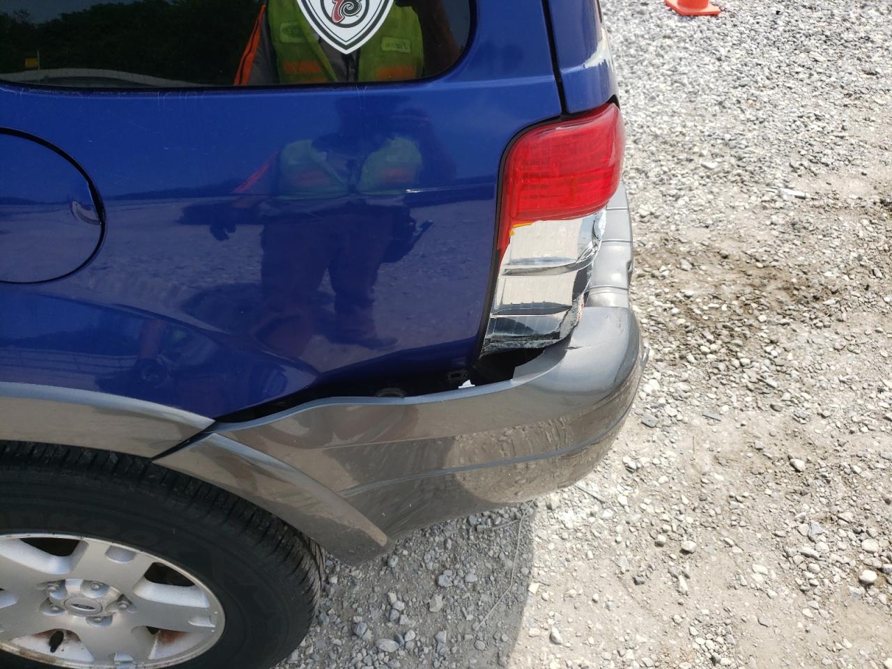 Photo 9 from auction – 2006 FORD ESCAPE XLT with VIN 1FMYU93166KC23989