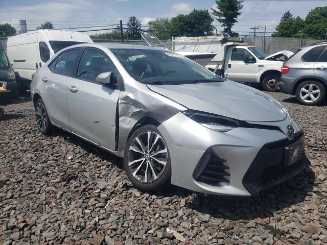 TOYOTA COROLLA L 2017 with VIN 5YFBURHE5HP597830 - Photo from auction