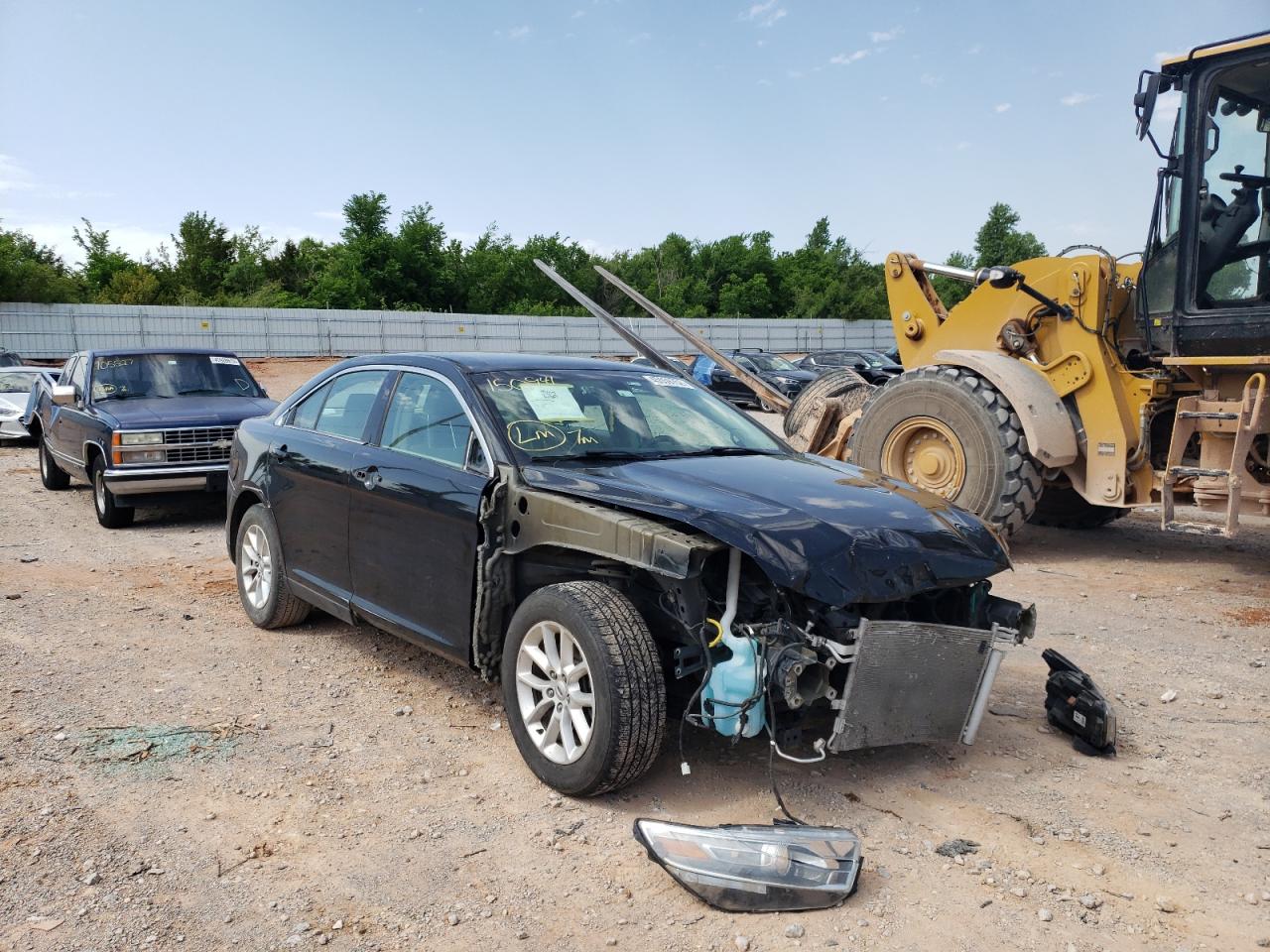 FORD TAURUS SE 2014 with VIN 1FAHP2D8XEG150941 - Photo from auction