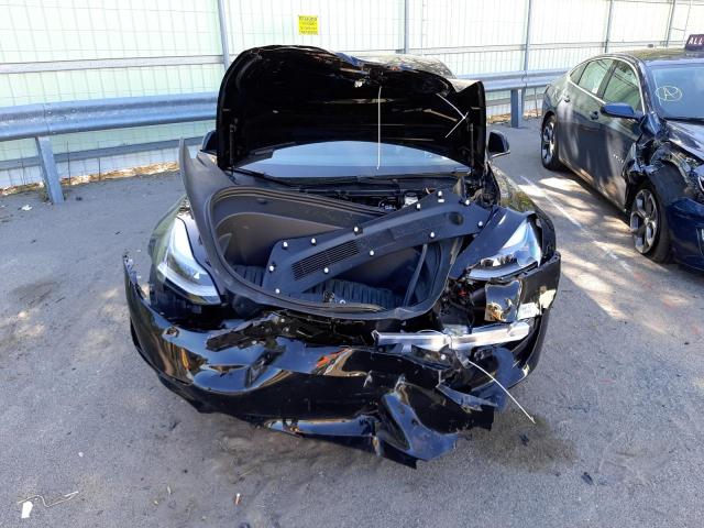 Photo 9 from auction – 2021 TESLA MODEL 3 with VIN 5YJ3E1EC1MF061131