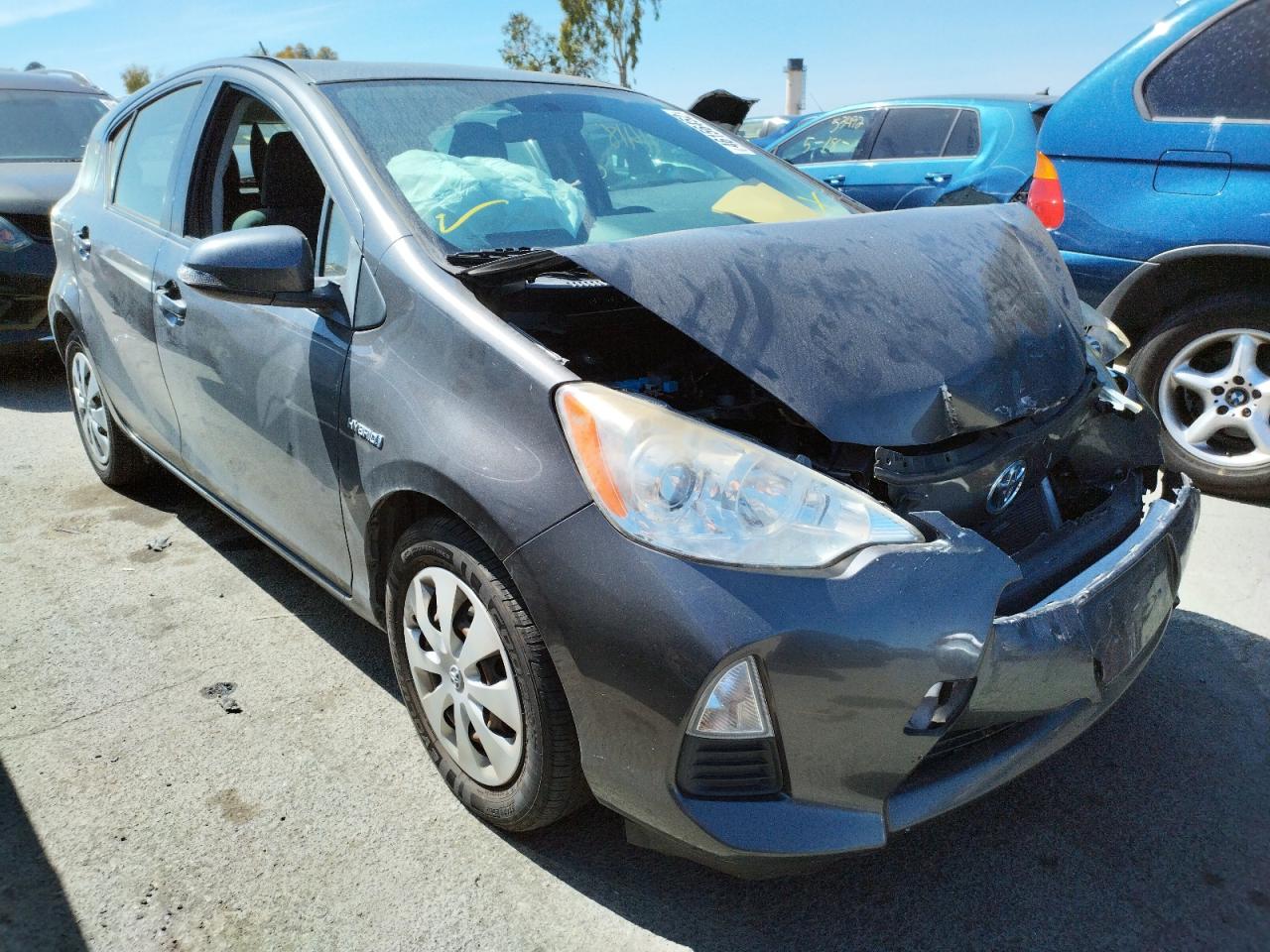 TOYOTA PRIUS C 2012 with VIN JTDKDTB3XC1519397 - Photo from auction