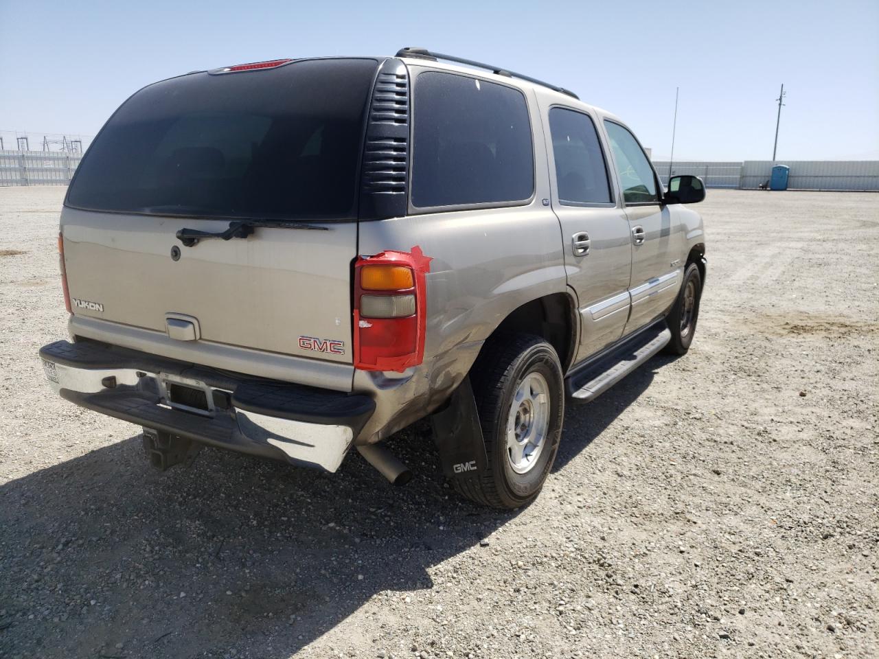 Photo 4 from auction – 2003 GMC YUKON with VIN 1GKEC13T73R268234