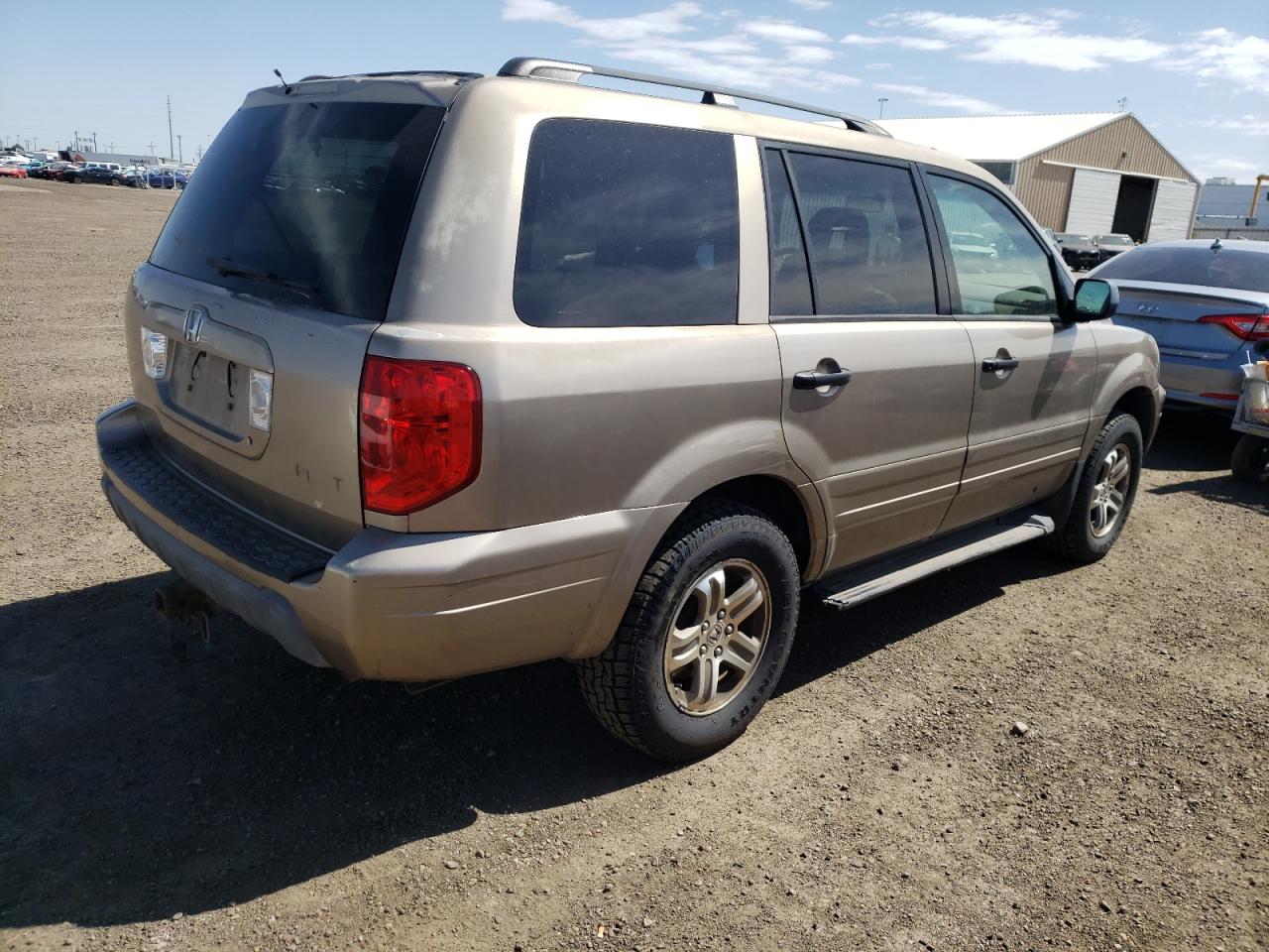 Photo 4 from auction – 2003 HONDA PILOT EXL with VIN 2HKYF18573H550987