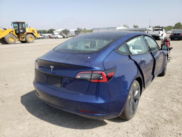 Photo 4 from auction – 2021 TESLA MODEL 3 with VIN 5YJ3E1EA4MF875224