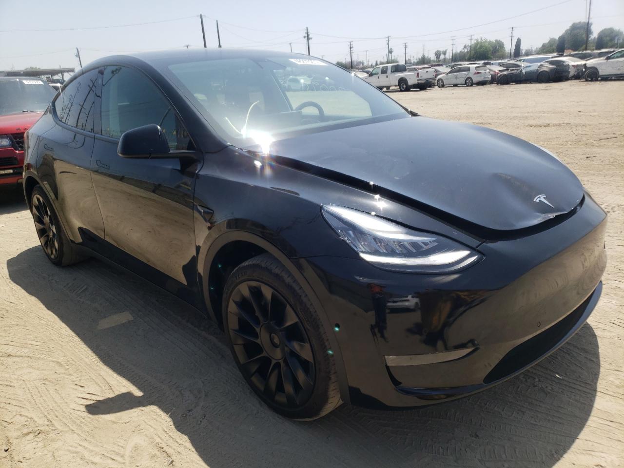 TESLA MODEL Y 2021 with VIN 5YJYGDED4MF124166 - Photo from auction