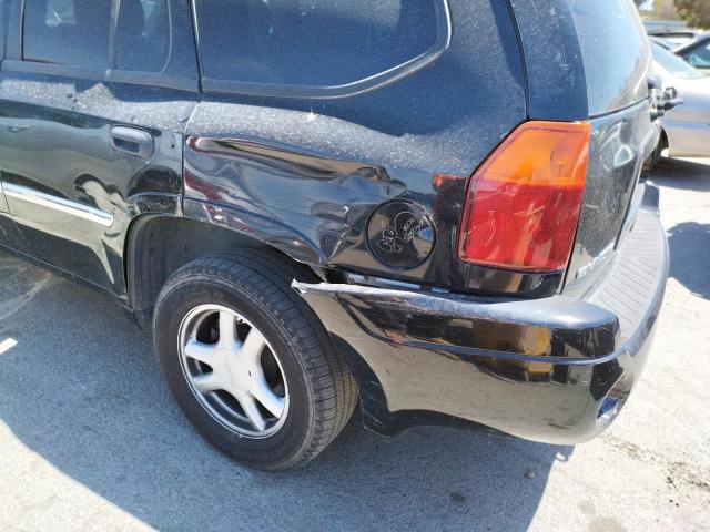 Photo 9 from auction – 2006 GMC ENVOY with VIN 1GKDS13SX62326307