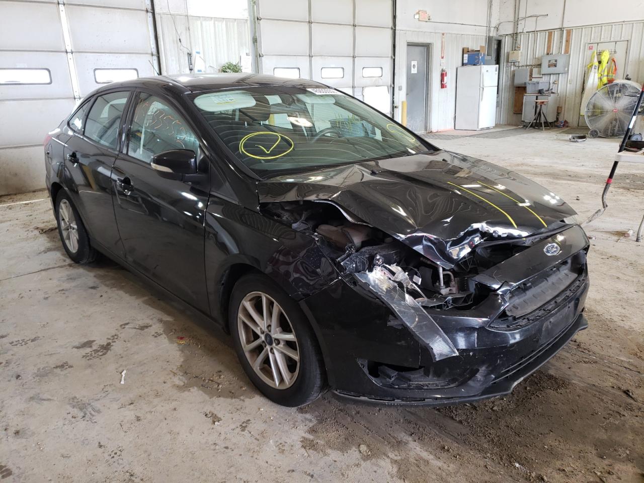 FORD FOCUS SE 2015 with VIN 1FADP3F23FL216882 - Photo from auction