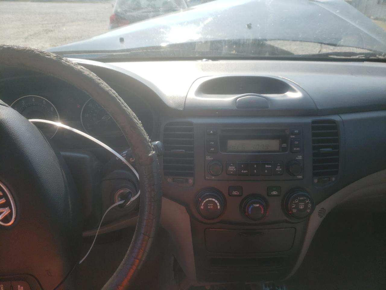 Photo 9 from auction – 2006 KIA OPTIMA LX with VIN KNAGE123865022513