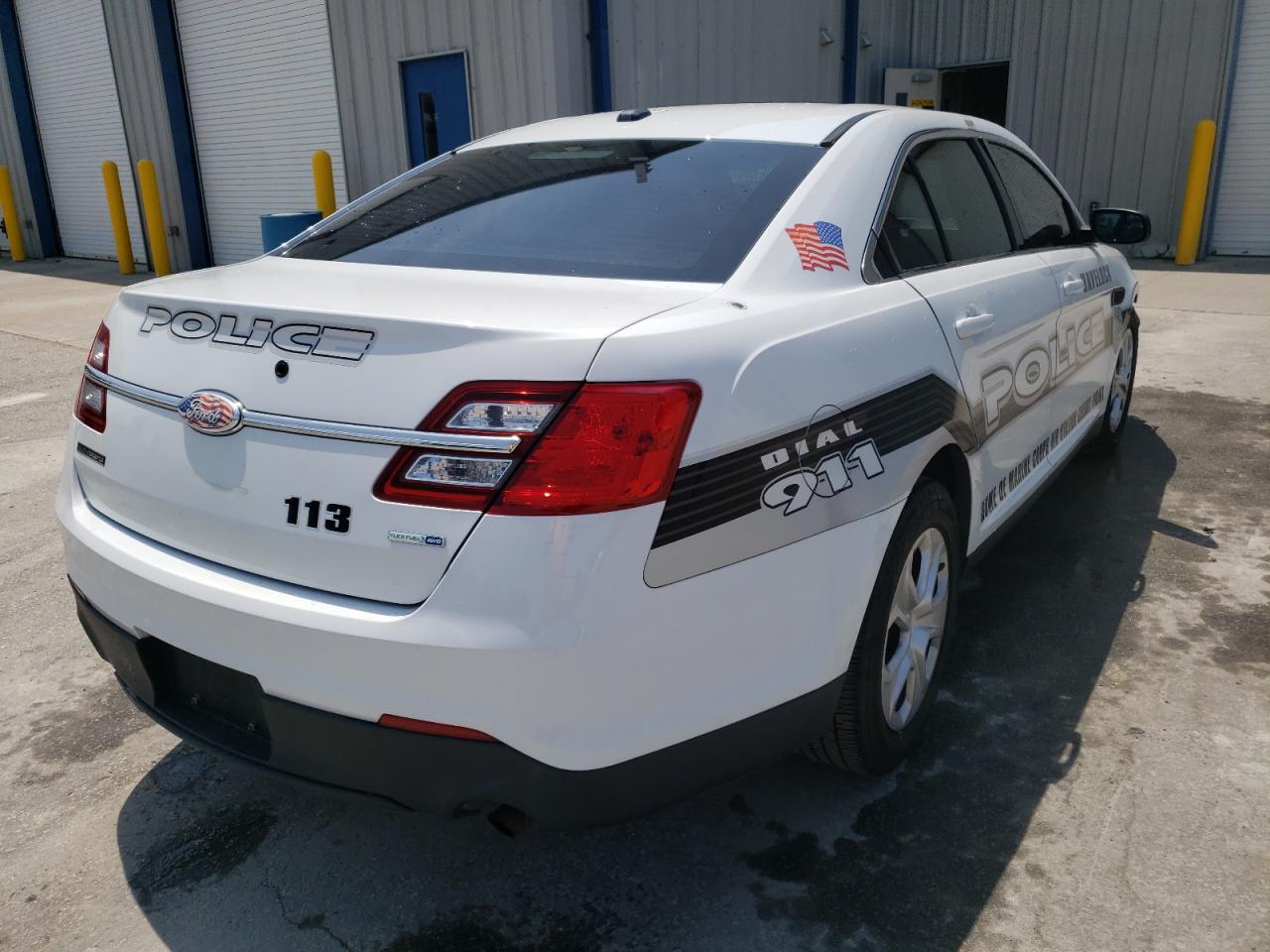 Photo 4 from auction – 2015 FORD TAURUS POL with VIN 1FAHP2MK0FG121509