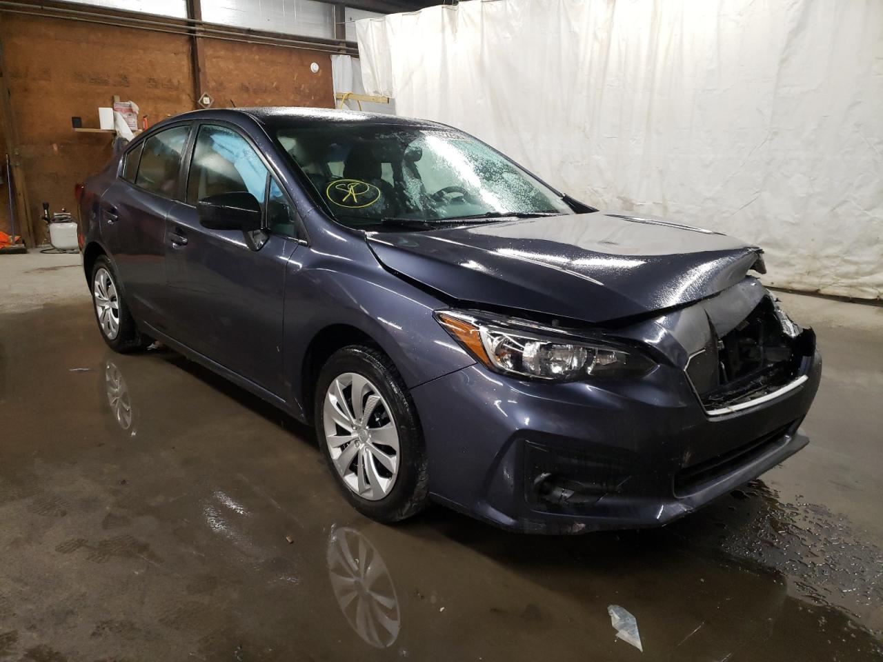 SUBARU IMPREZA 2017 with VIN 4S3GKAA65H3616899 - Photo from auction