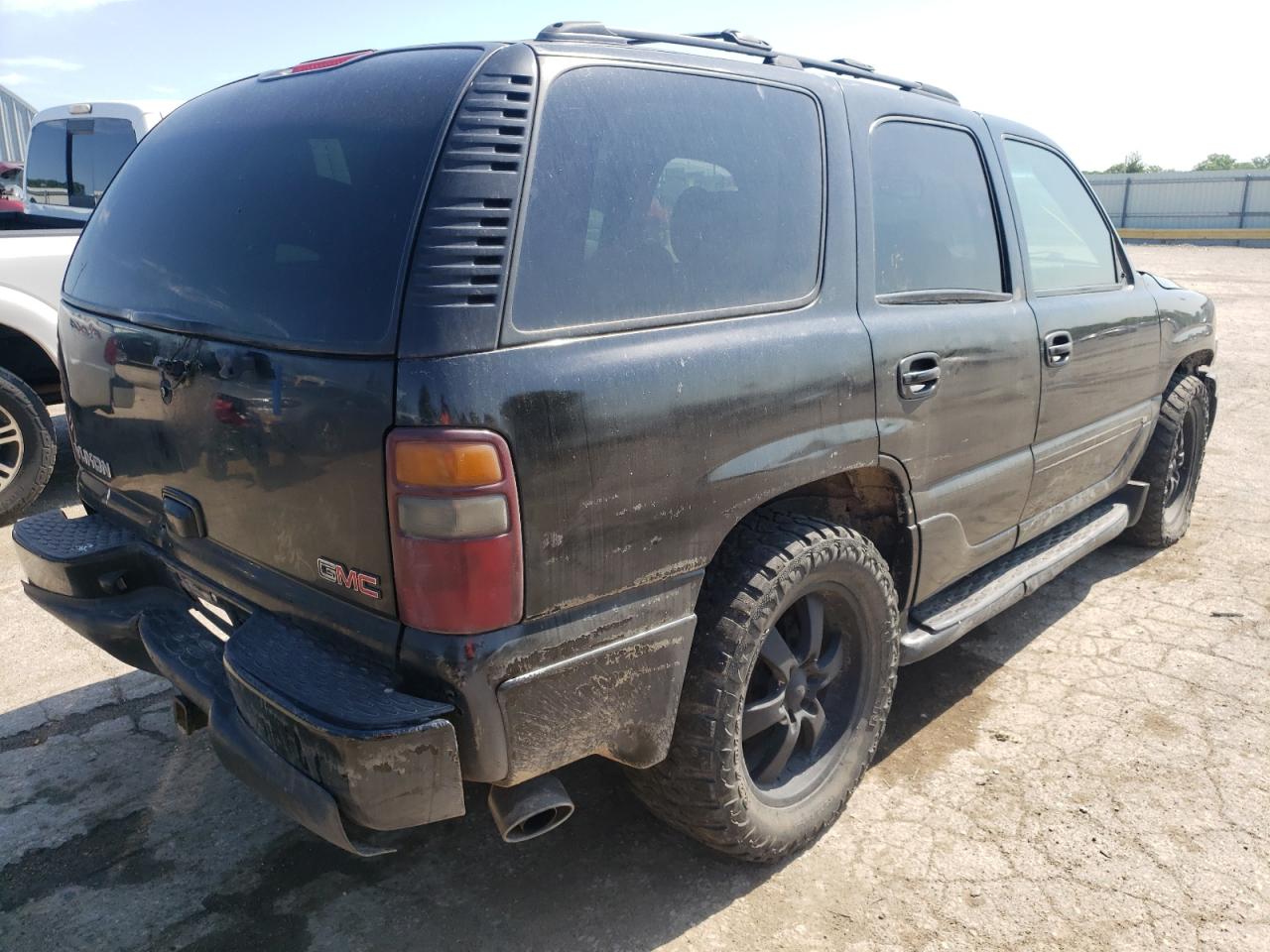 Foto 4 de la subasta – 2002 GMC DENALI con VIN 1GKEK63U92J318850