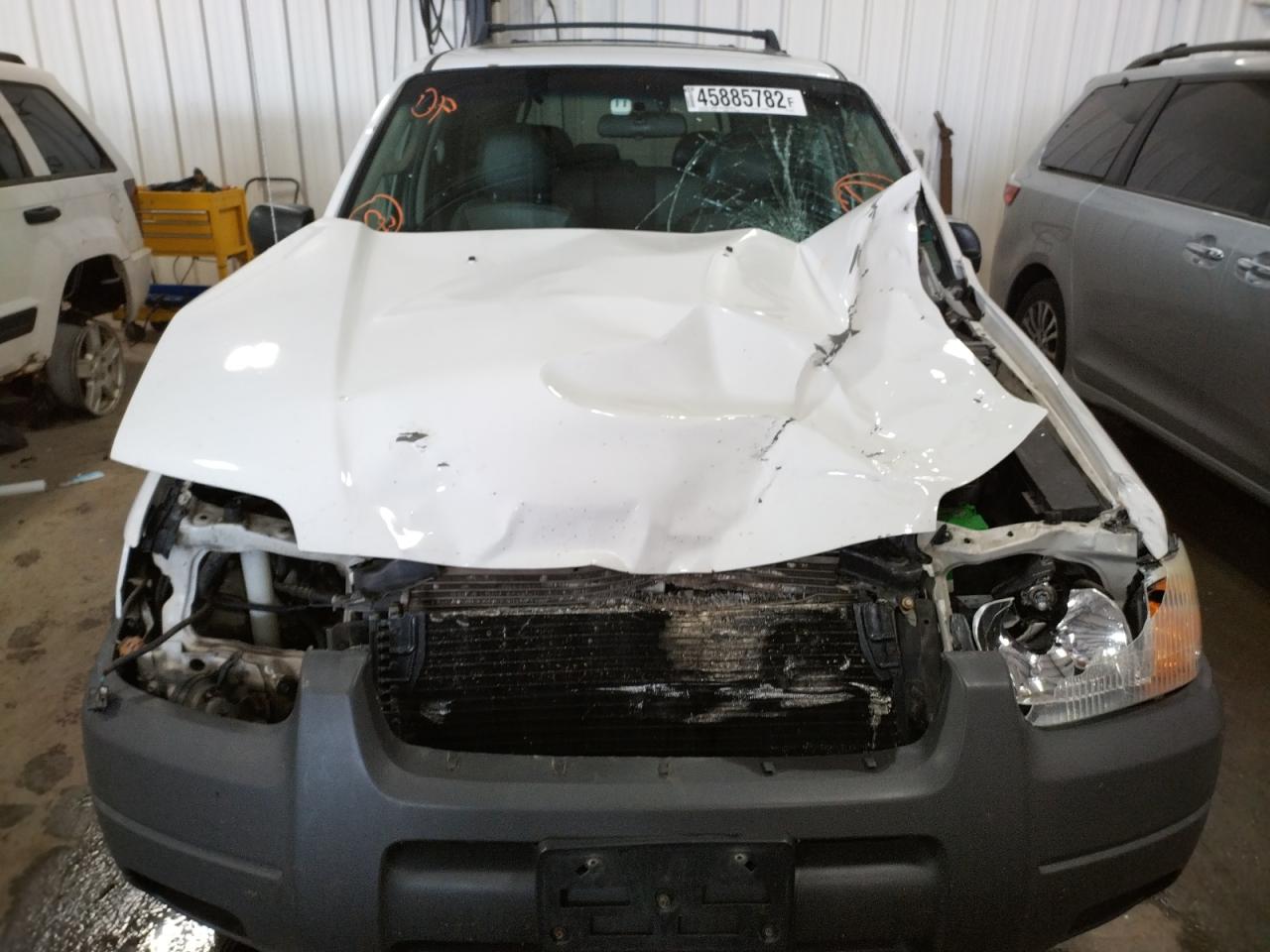 Photo 20 from auction – 2004 FORD ESCAPE XLT with VIN 1FMYU93154KA38295