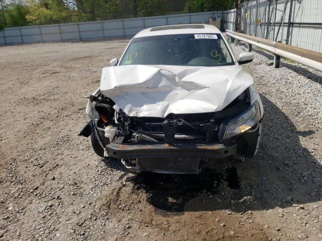 Photo 7 from auction – 2013 VOLKSWAGEN PASSAT SEL with VIN 1VWCP7A34DC077322