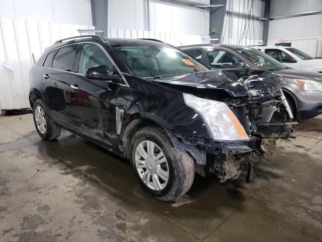 CADILLAC SRX 2014 with VIN 3GYFNAE3XES587919 - Photo from auction