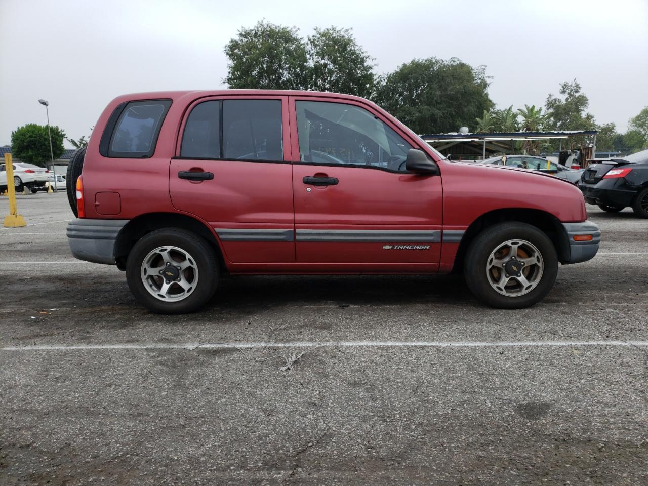 Photo 9 from auction – 2000 CHEVROLET TRACKER with VIN 2CNBE13C5Y6915348