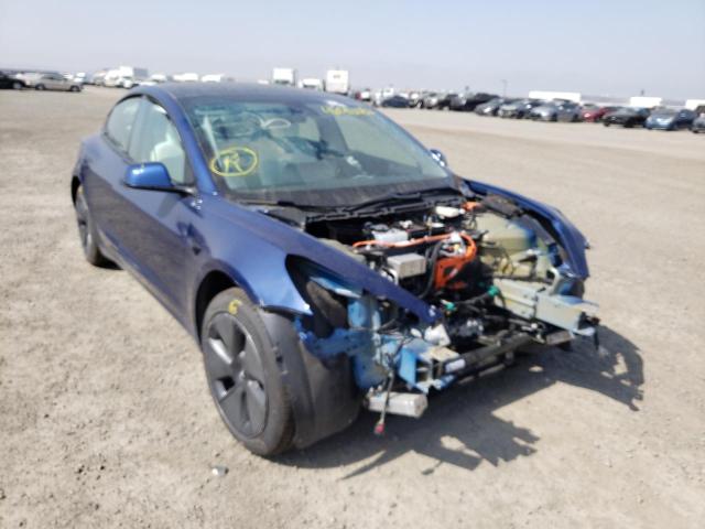 TESLA MODEL 3 2021 with VIN 5YJ3E1EA4MF875224 - Photo from auction