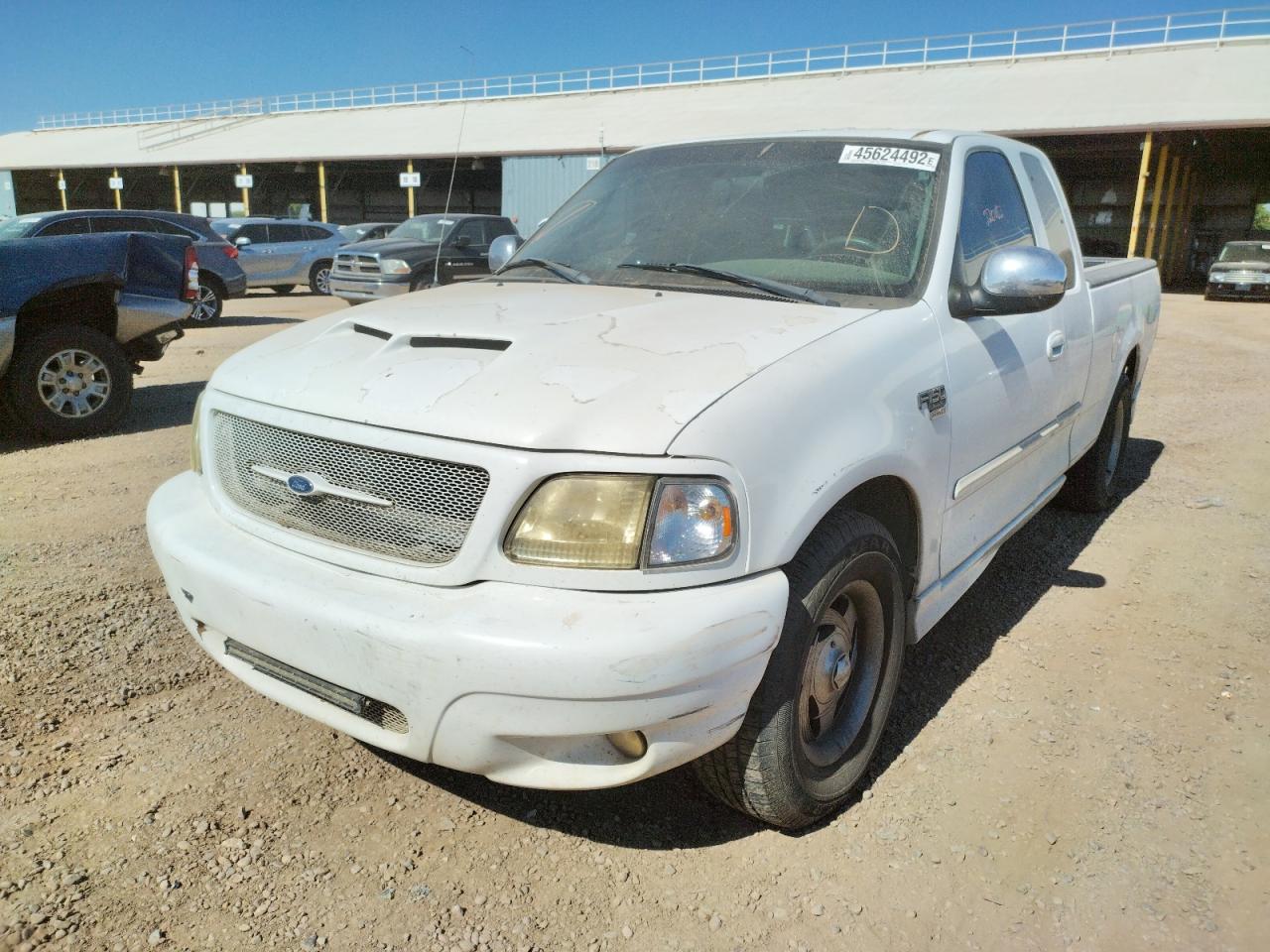 Photo 2 from auction – 2002 FORD F150 with VIN 1FTRX17W02KA57809