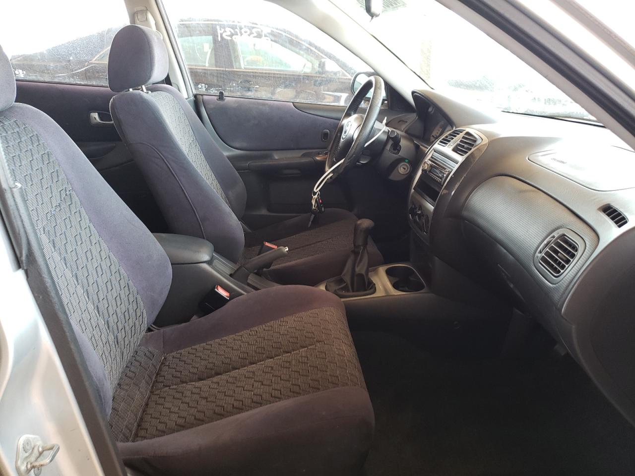 Photo 5 from auction – 2003 MAZDA PROTEGE PR with VIN JM1BJ245231212257