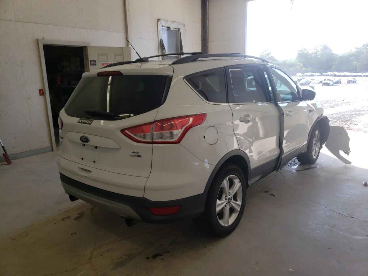 Photo 4 from auction – 2013 FORD ESCAPE SE with VIN 1FMCU9G99DUB45235