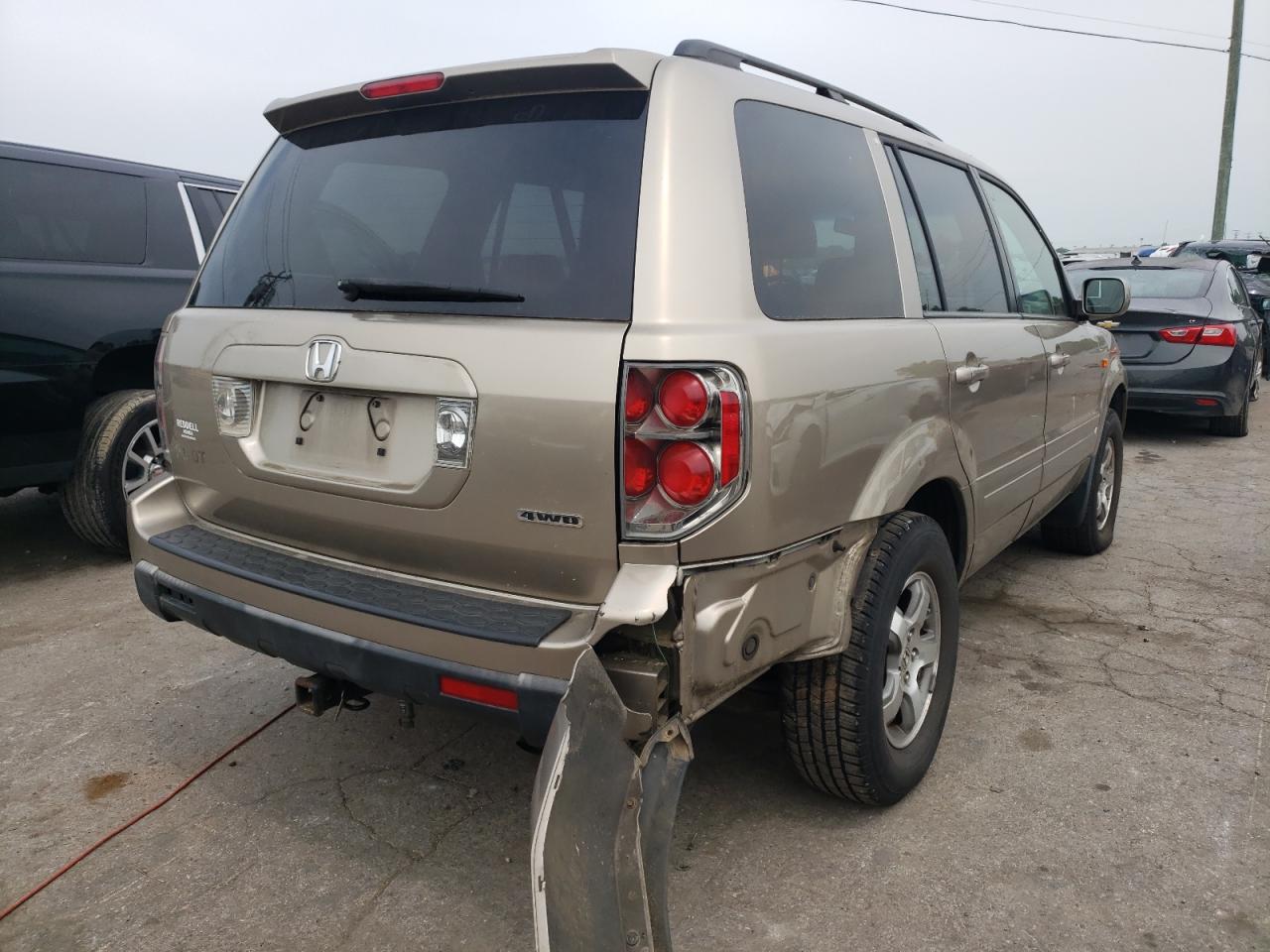 Photo 20 from auction – 2006 HONDA PILOT EX with VIN 2HKYF18576H539718