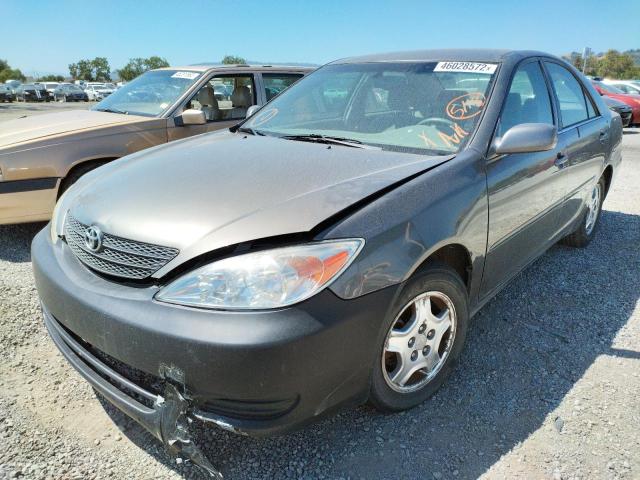 Photo 2 from auction – 2002 TOYOTA CAMRY LE with VIN 4T1BF30K12U517986