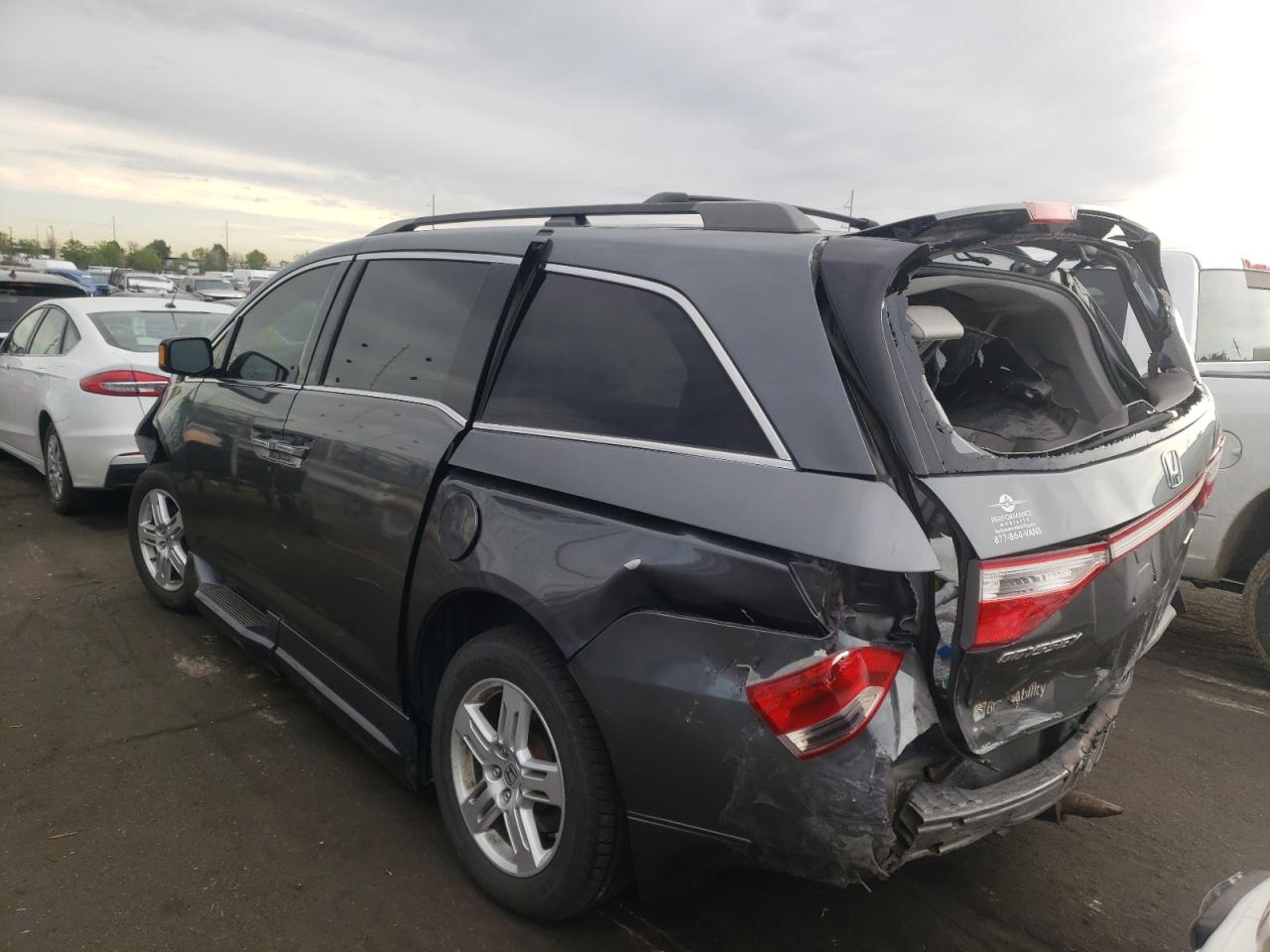 Photo 3 from auction – 2012 HONDA ODYSSEY TO with VIN 5FNRL5H99CB047354