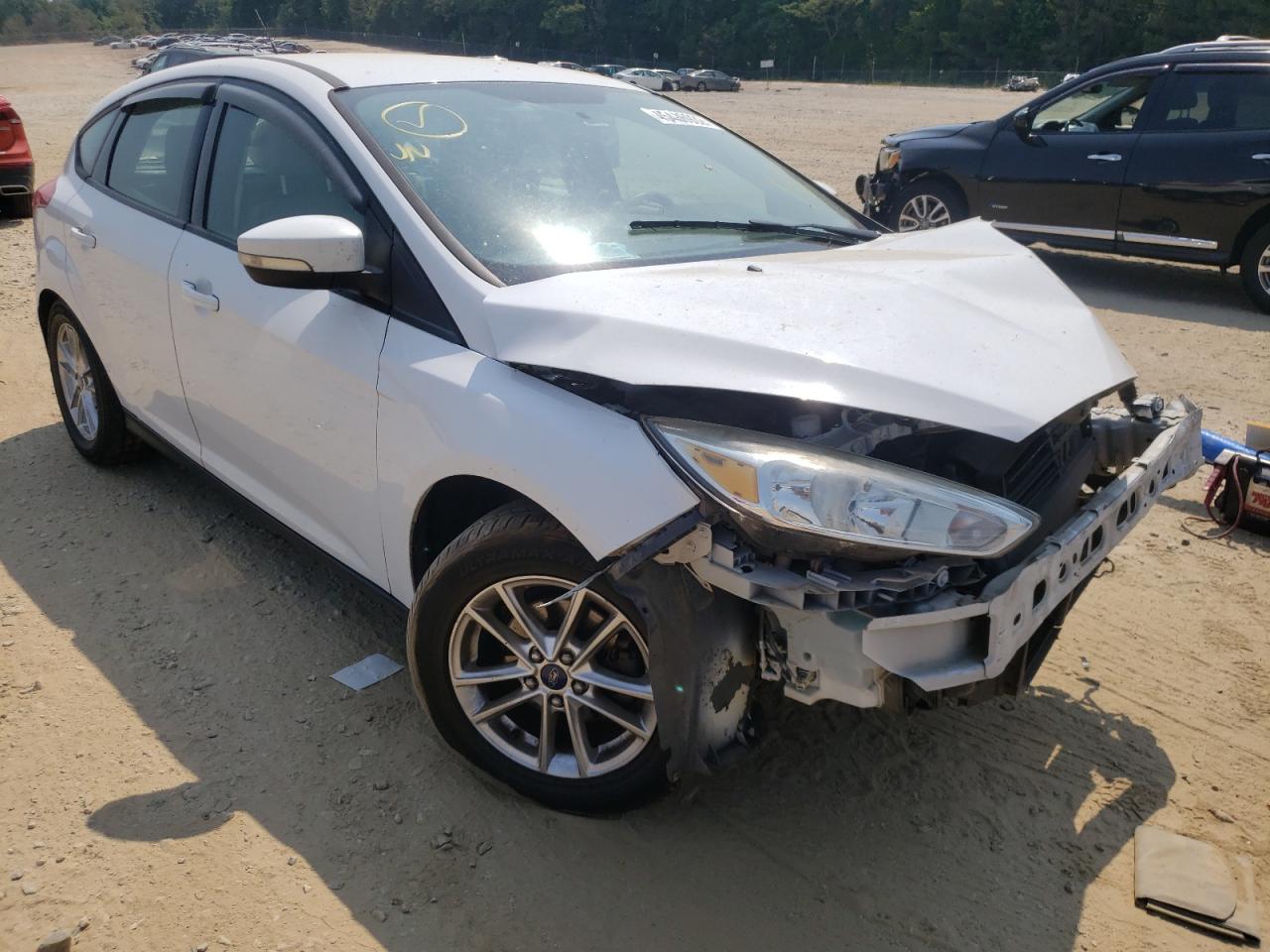 FORD FOCUS SE 2015 with VIN 1FADP3K22FL317790 - Photo from auction