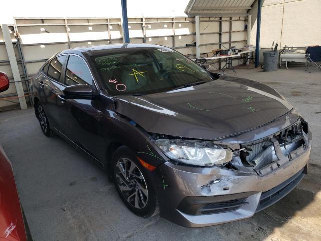 HONDA CIVIC EX 2018 with VIN 2HGFC2F79JH606090 - Photo from auction