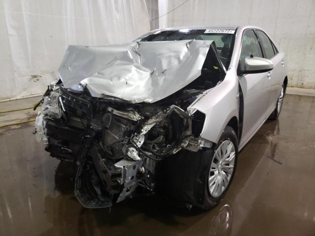 Photo 2 from auction – 2012 TOYOTA CAMRY HYBR with VIN 4T1BD1FK0CU035609