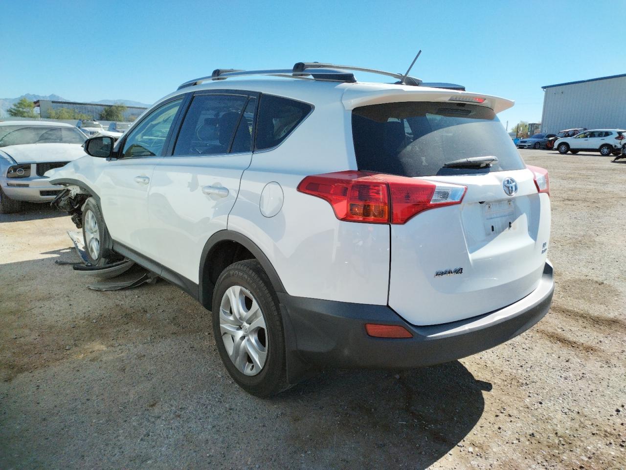 Photo 3 from auction – 2015 TOYOTA RAV4 LE with VIN JTMBFREV2FD171950
