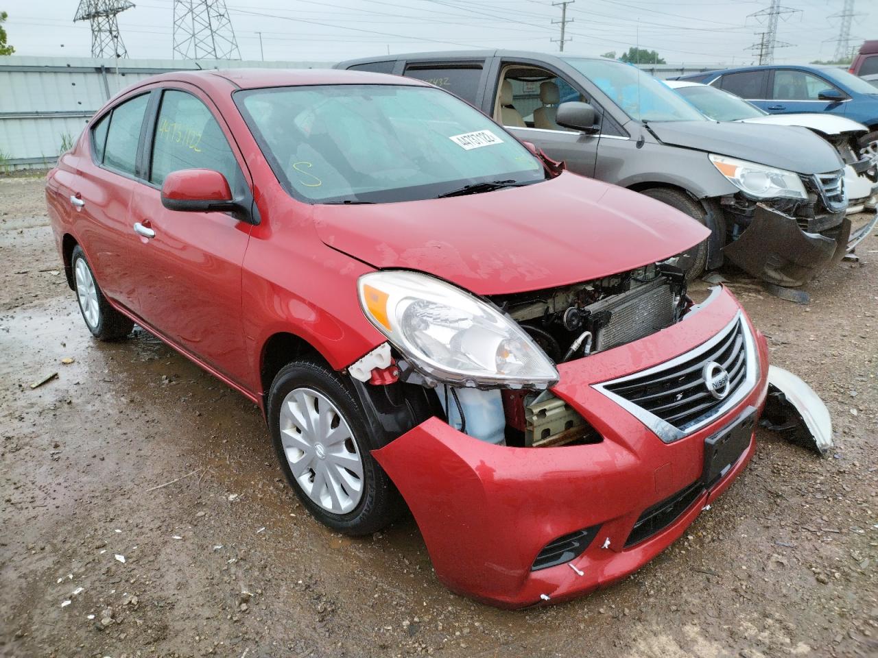 NISSAN VERSA S 2012 with VIN 3N1CN7AP1CL905604 - Photo from auction