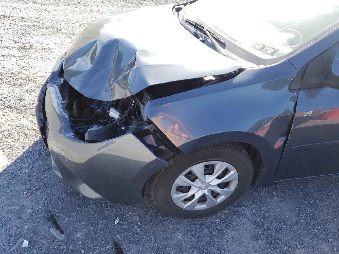 Photo 9 from auction – 2014 TOYOTA COROLLA EC with VIN 2T1BPRHEXEC193733