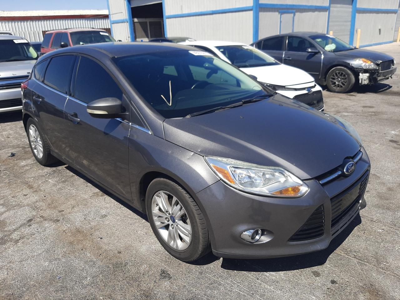 FORD FOCUS SEL 2012 with VIN 1FAHP3M23CL366975 - Photo from auction