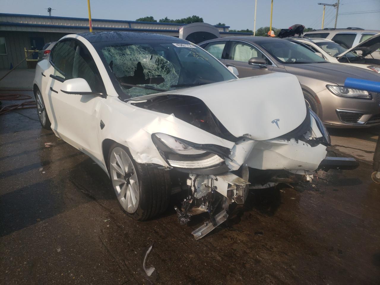 TESLA MODEL 3 2021 with VIN 5YJ3E1EB2MF101076 - Photo from auction