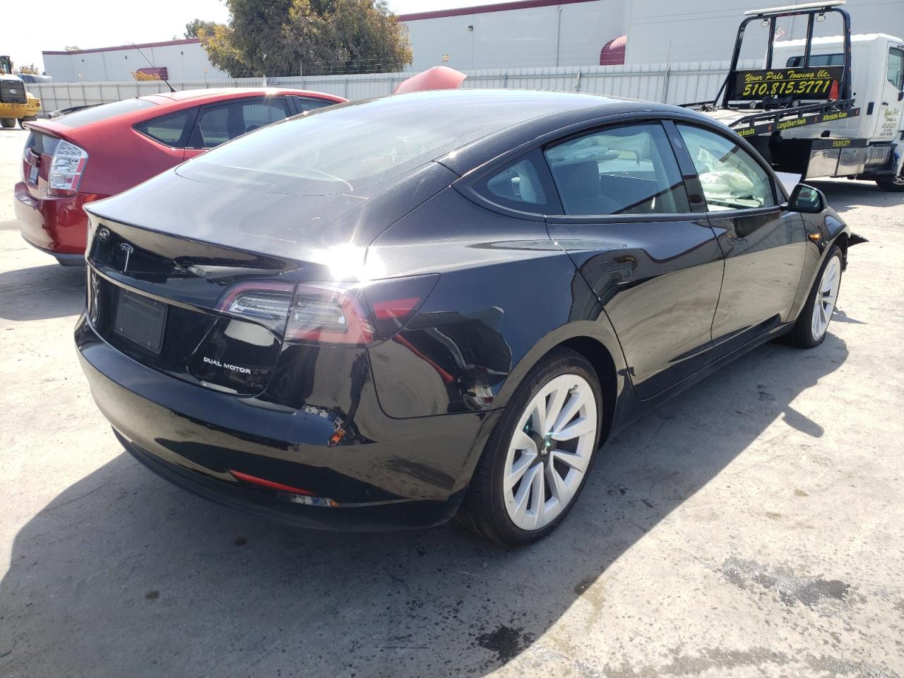 Photo 4 from auction – 2022 TESLA MODEL 3 with VIN 5YJ3E1EB9NF143293